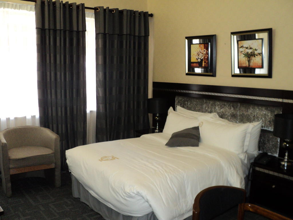 Chez Hotel Inn Йоханнесбург Номер фото